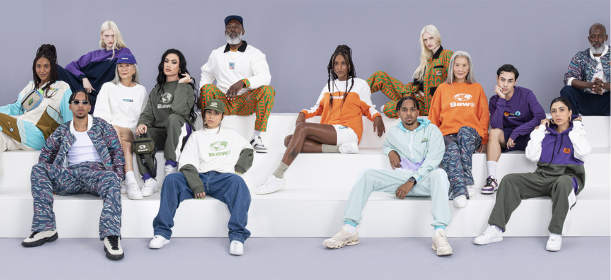 Grupo diverso de pessoas com roupas modernas e coloridas.